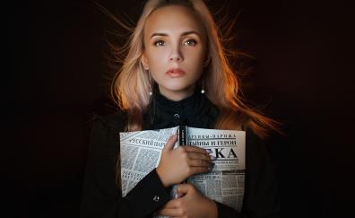 Beautiful woman with book, blonde, portrait