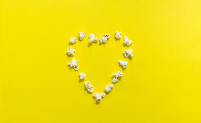Popcorn, heart shape, yellow background, minimal