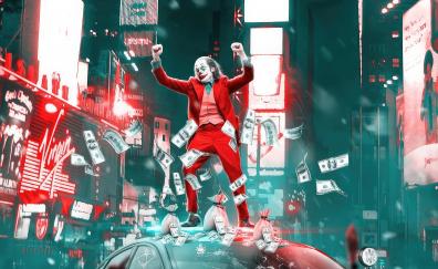Joker dancing on the police car, looted money, movie art