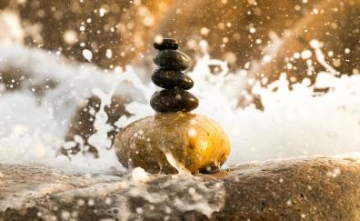 Balance, rocks, water splash