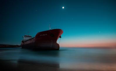 Ship at coast, sea, sunset, reflection